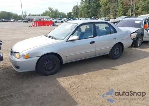2001 Toyota Corolla Le from USA, damaged, VIN 2T1BR12E41C426052